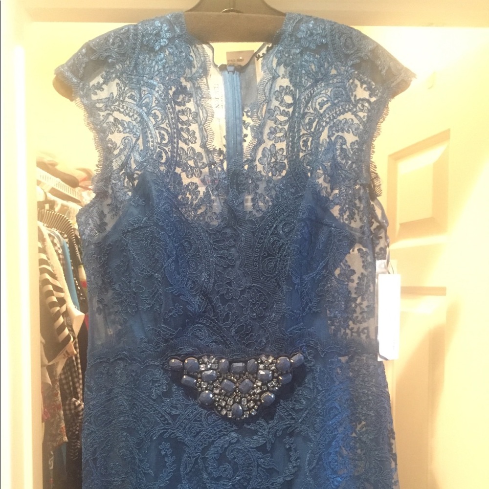 Formal, teal-blue lace gown.